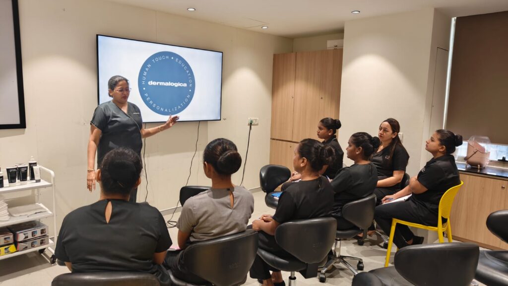 Dermalogica brings global skincare education to life at LTA. Learn, practise, and prepare for CIDESCO success with us. Devangi Vala, Technical Manager, LTA School of Beauty shared glimpses of this seminar in a candid interview with Priyanka Parshurami. As the Technical Manager at LTA School of Beauty, Devangi’s role is to ensure that their CIDESCO students receive education that reflects real international industry practices. When they planned the Dermalogica Look and Learn seminar, the intent was to move beyond theory and give students hands-on exposure to a global professional skincare brand they will work with during their examinations and future careers. T Here is an excerpt from the session that was designed to build clarity, confidence, and practical understanding in a way that truly prepares students for international standards: Dermalogica is a key professional brand within our CIDESCO skin curriculum at LTA School of Beauty. We curated this Dermalogica Look and Learn seminar to ensure students experience international skincare education beyond textbooks. The purpose was simple. Students needed to understand how a global brand works in real professional settings and examinations. During this Dermalogica seminar, our focus was on building strong product knowledge. Dermalogica is used in CIDESCO practical exams, so clarity on ingredients and results is essential. We discussed hero products, hero ingredients, and how these formulations perform across different skin types in India and globally. The Dermalogica session was structured around clear learning goals: • Exposure to an internationally recognised professional skincare brand • Understanding ingredient-led results and product performance • Preparing students for CIDESCO examination protocols A key highlight of the Dermalogica Look and Learn seminar was face mapping. Students were trained to analyse the skin zone by zone using professional headgear with lamp and magnifying lenses. This method ensures no area is missed. It also helps identify actual skin type and concerns before selecting the correct Dermalogica product. Hands-on learning played an important role. Students worked on each other using cleanser, exfoliant, moisturiser, and hydration mist. This allowed them to feel product texture, observe absorption, and understand overall skin response while completing full face mapping routines. The session was further enriched with guidance from Hina Khan, who demonstrated correct headlamp usage and facial zone division. Students were highly engaged and confident by the end of the workshop. Dermalogica education at LTA School of Beauty builds confidence, competence, and careers. Explore the CIDESCO programmes at LTA School of Beauty NOW and upcoming workshops to begin your professional journey today. FAQs: • Why was the Dermalogica seminar conducted? To align CIDESCO students with international skincare standards. • Which skill was prioritised? Face mapping and professional skin analysis. • How does this help students? Dermalogica is part of CIDESCO practical exams.